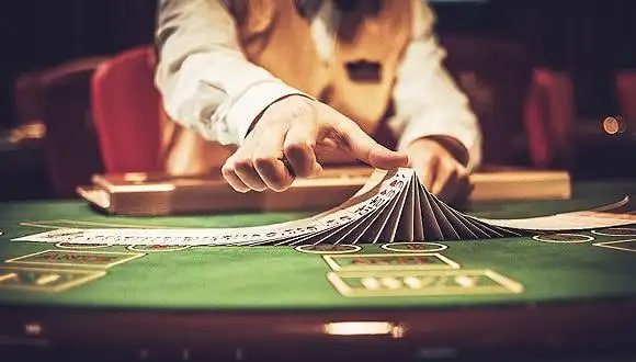 Filipino player enjoying jillicc fish game and casino on tablet device